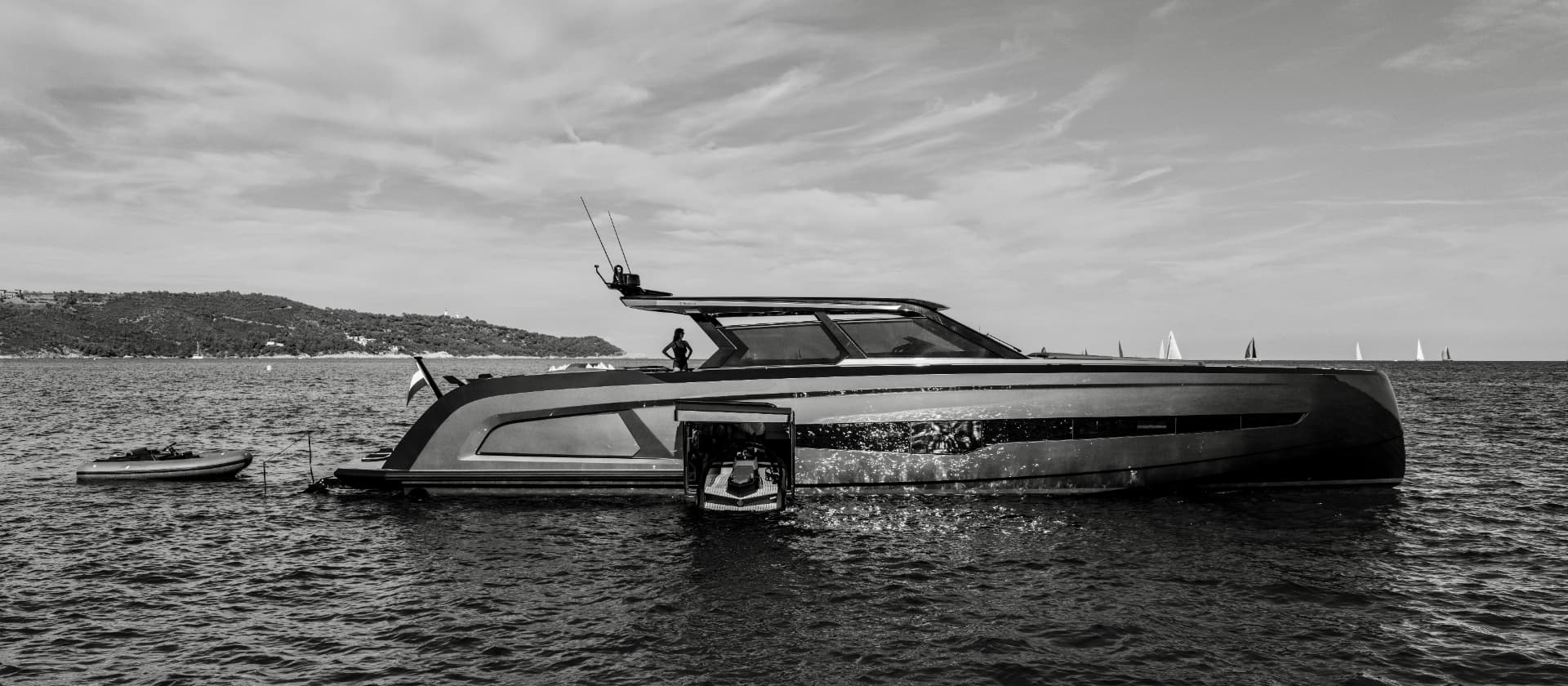 Yacht at anchor in black and white
